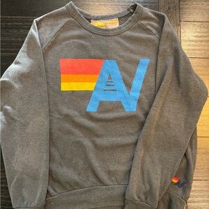 Aviator Nation Dark Gray Crewneck with Blue and Red Graphic
